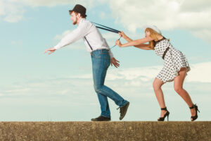 Man walking away from woman